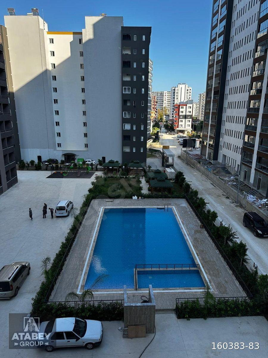 ERDEMLİ ARPAÇBAHŞİŞTE LÜKS SİTE İÇERİSİNDE SATILIK 1+1 DAİRE