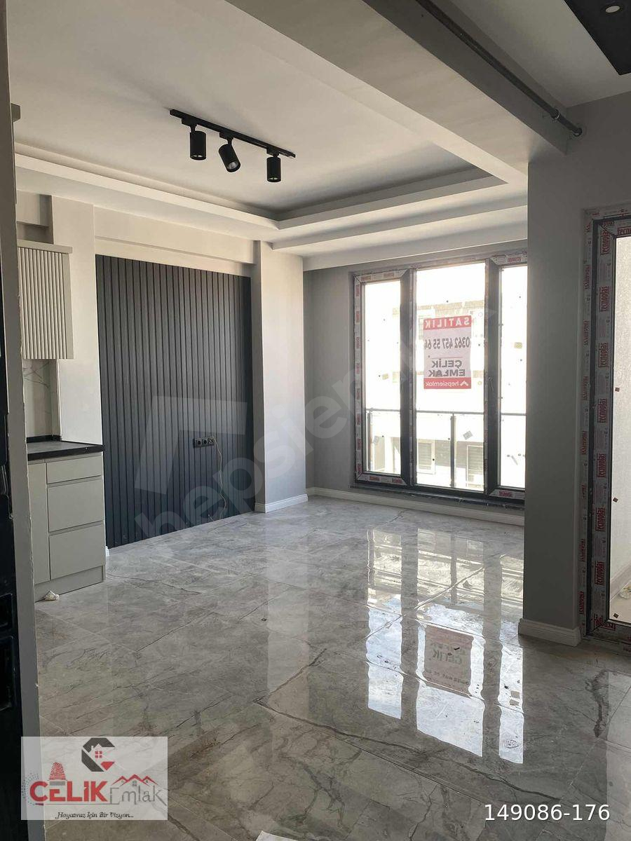 ÇELİK EMLAK SAHILE YÜRÜME MESAFESİ DEPOZITOSUZ 1+1 DAİRE