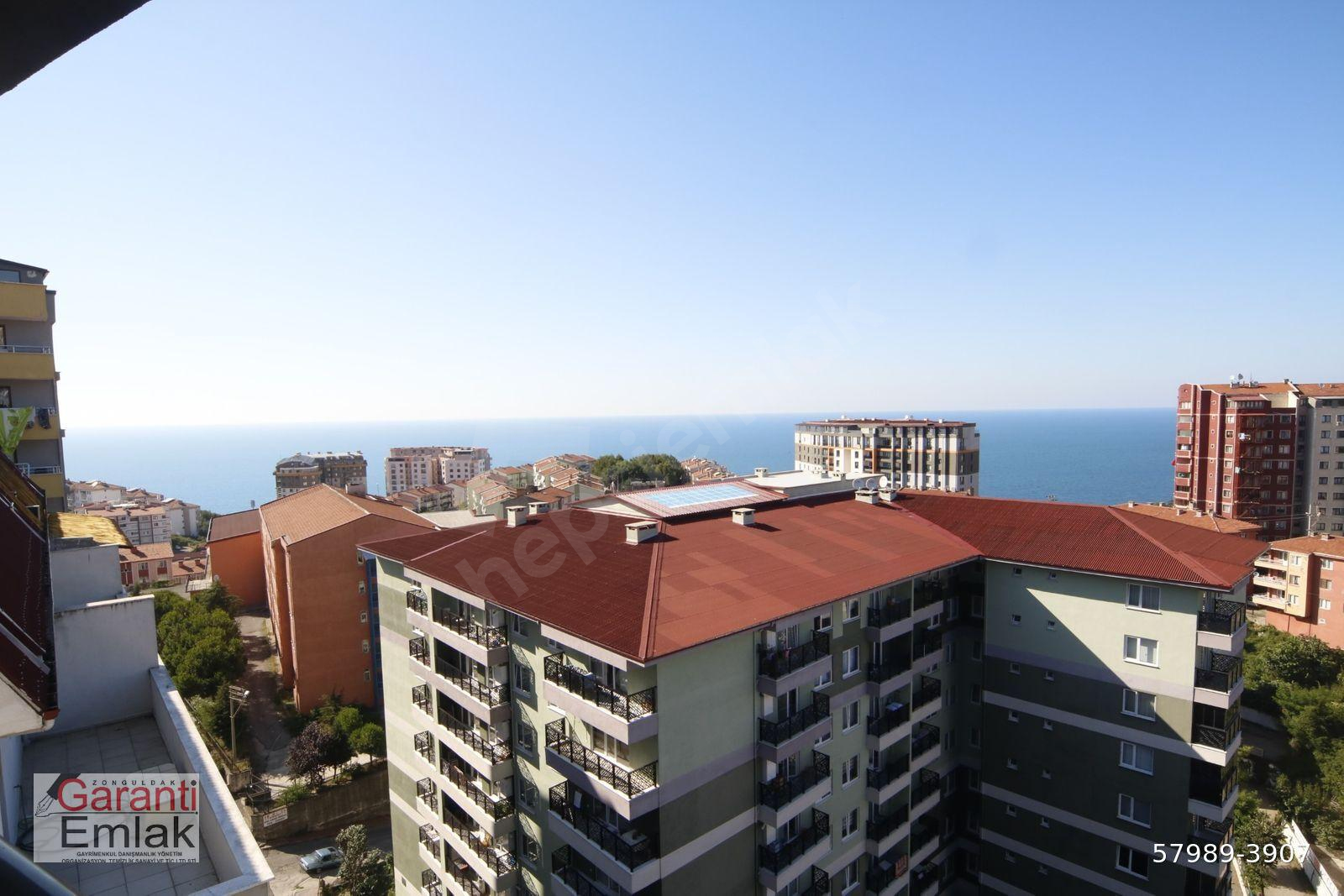 ZONGULDAK GARANTİ EMLAK'TAN KOZLU FATİH SİTESİNDE ÖN CEPHE, ÖNÜ AÇIK, BALKONLU 3+1 SATILIK DAİRE
