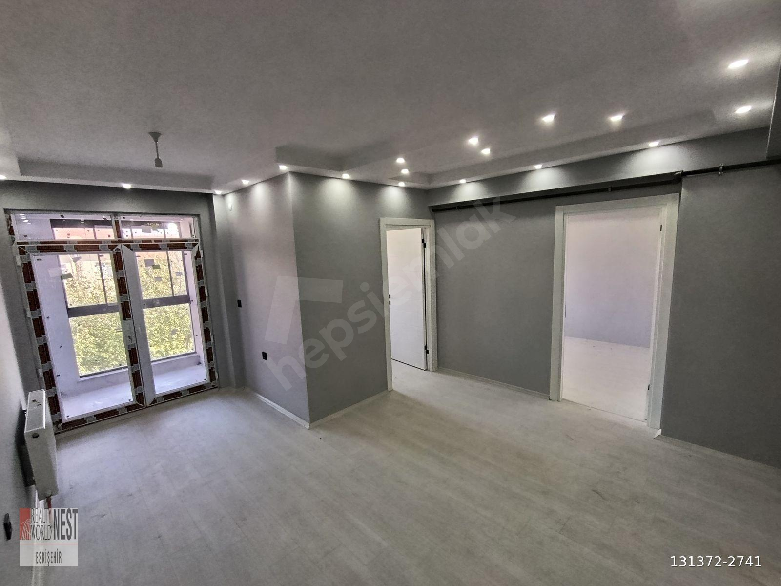 RW NEST'TEN A.Ü İLETİŞİM KAPISI YAKINI SATILIK İSKANLI 2+0 DAİRE