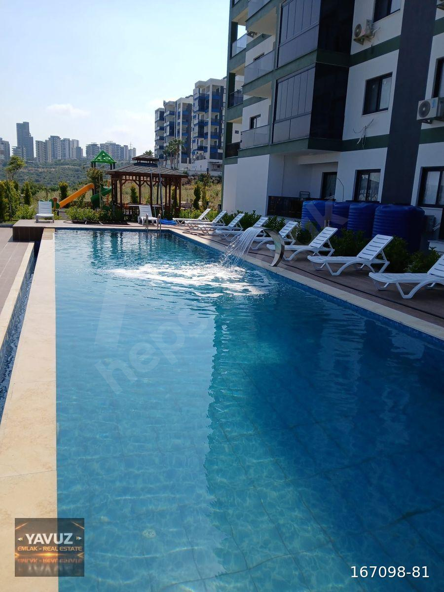 ERDEMLİ KUMKUYU TIRTAR HAVUZLU SİTE İÇİ EŞYALI KİRALIK DAİRE 1+1