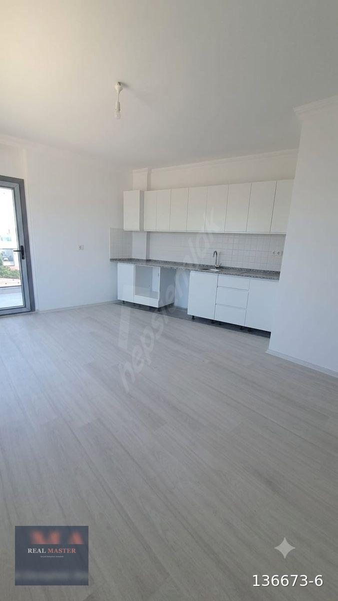 MUMCULAR MERKEZ'DE ARA KAT 1+1 SATILIK DAİRE