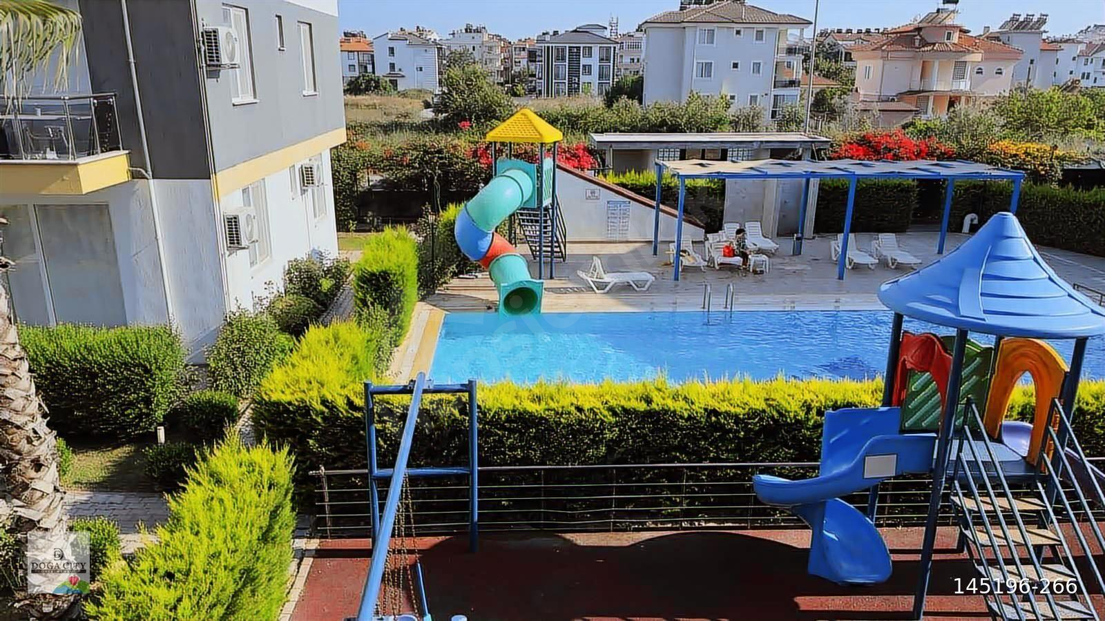 Dalaman Merkezde Çift Havuzlu Sitede 2+1 Eşyalı Kiralık Daire