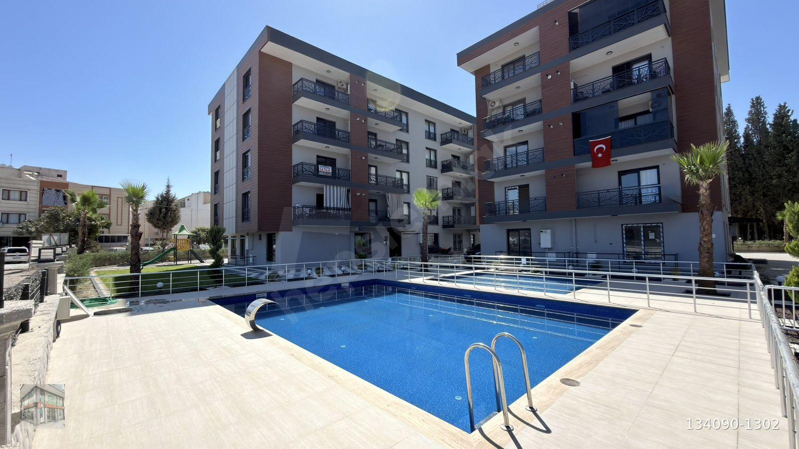 GÖRAL EMLAK’TAN HAVUZLU GÜVENLİKLİ SİTE İÇERİSİNDE 1+1 EŞYALI KİRALIK DAİRE