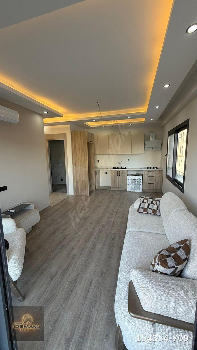 ERDEMLİ MERKEZ 1+1 HAVUZLU LÜKS DENİZ MANZARALI SATILIK DAİRE