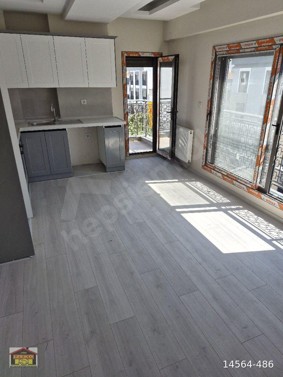 Karşıyaka Bahçelievler Sıfır 2+1 Kiralık Daire