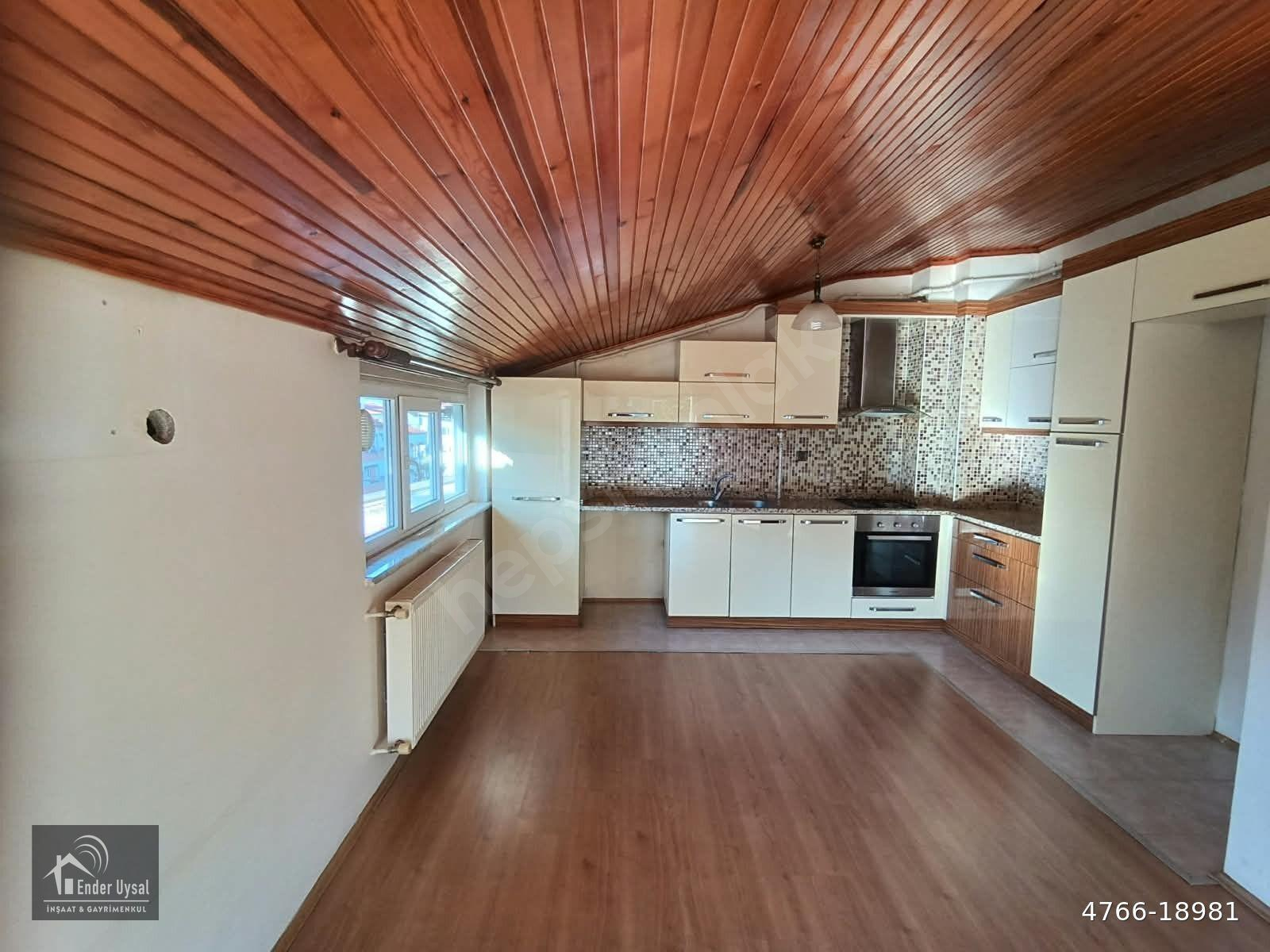 ENDER UYSAL GAYRİMENKULDEN KINIKLIDA 2+1 100 M2 AMERİKAN MUTFAK TERASLI ÇATIKATI .DAİREDE OCAK FIRIN
