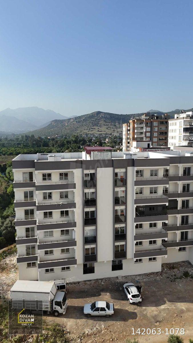 KOZAN DİVAN EMLAK'TAN ŞEKER GROSS ARKASI SIFIR AZ KATLI 4+0