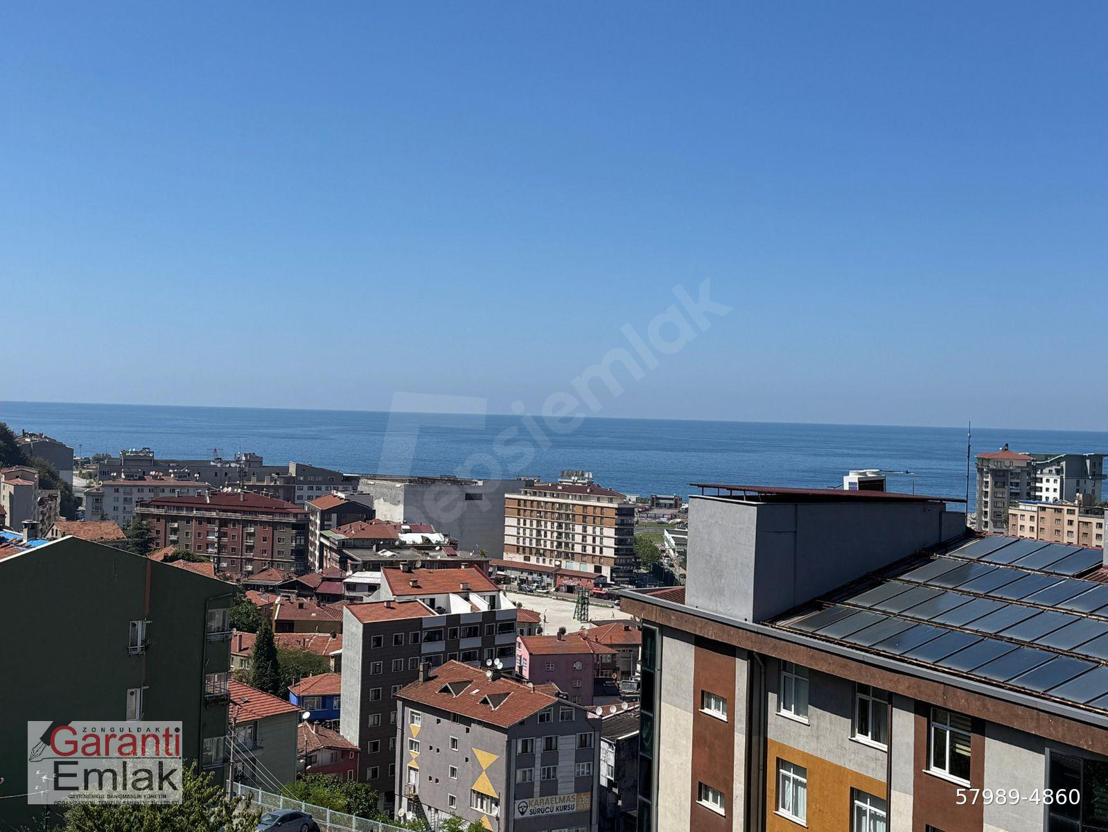 ZONGULDAK GARANTİ EMLAK'TAN KOZLU MERKEZ'DE DENİZ MANZARALI VE BALKONLU 1+1 KİRALIK DAİRE