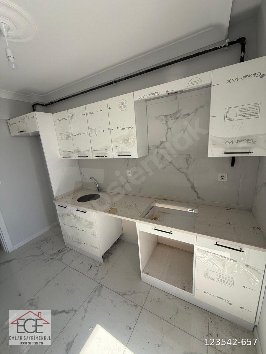 EGE EMLAK'TAN OTOGAR KARŞISINDA ARA KATTA SATILIK 2+1 DAİRE