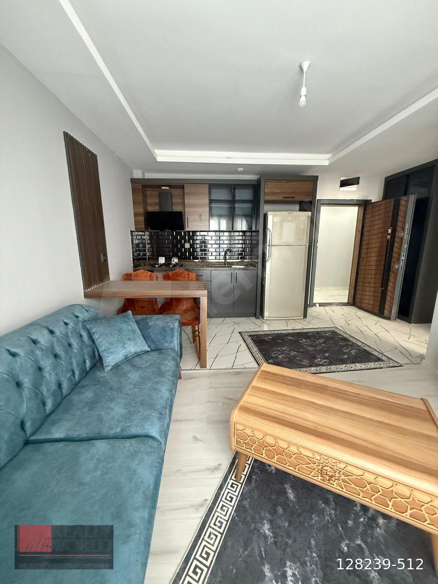 ERDEMLİ TÖMÜK'TE 1+1 HAVUZLU FUL EŞYALI KİRALIK DAİRE