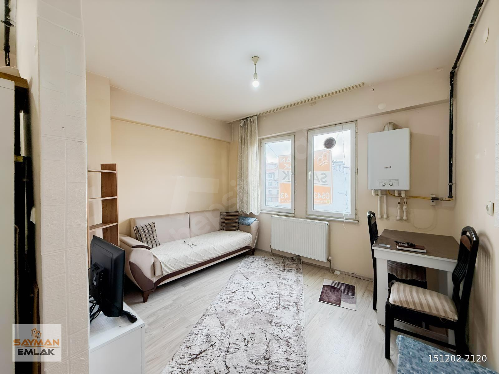 SAYMAN'DAN MERKEZDE FULL EŞYALI 1+1 SATILIK DAİRE