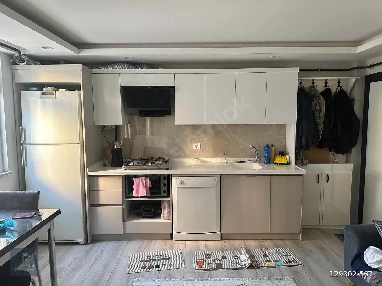 DÖNÜŞÜM EMLAK'TAN 1+1 ARA KAT EŞYALI SATILIK DAİRE. SOFULAR M.