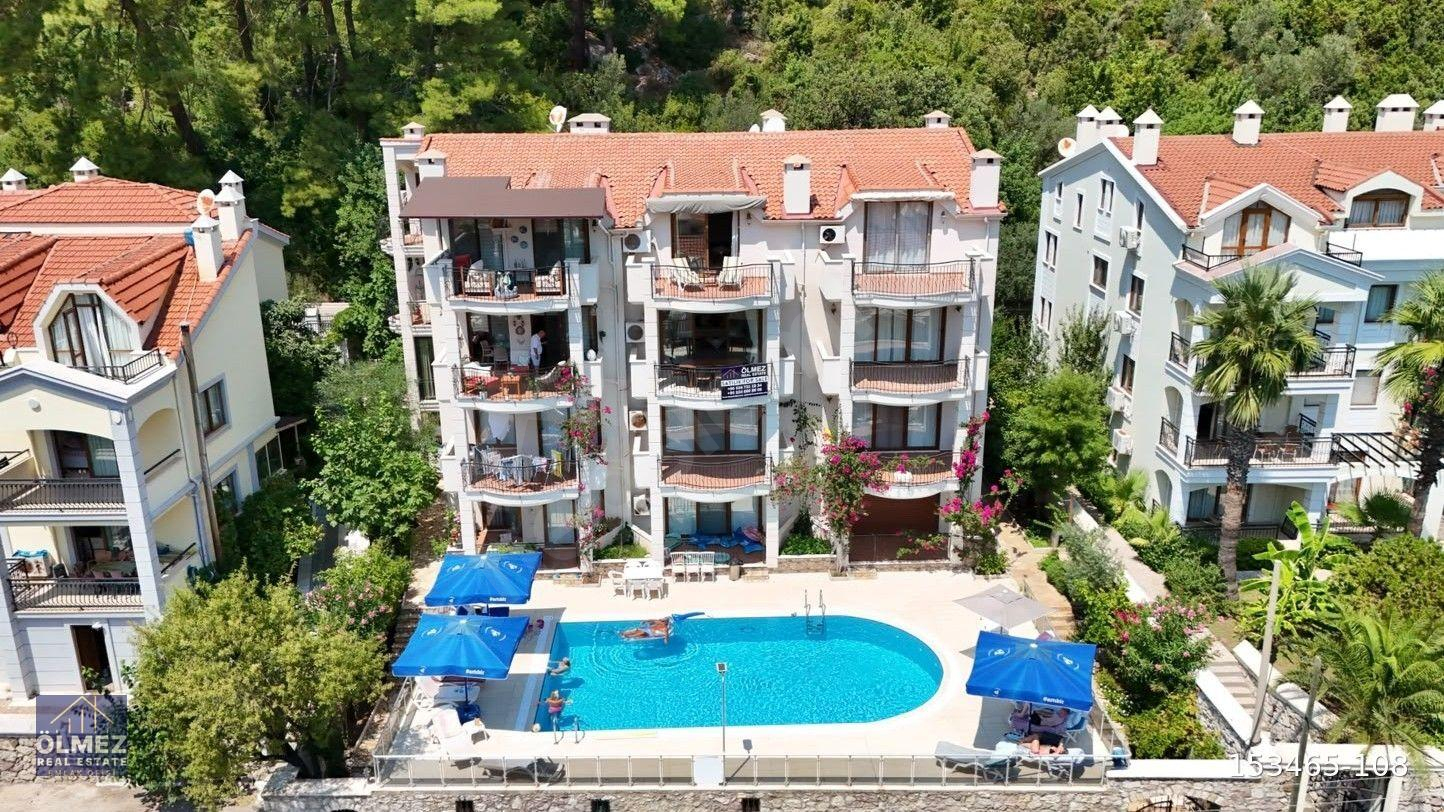 MARMARİS TURUNÇ'TA DENİZ VE DOĞA MANZARALI DUBLEKS DAİRE.