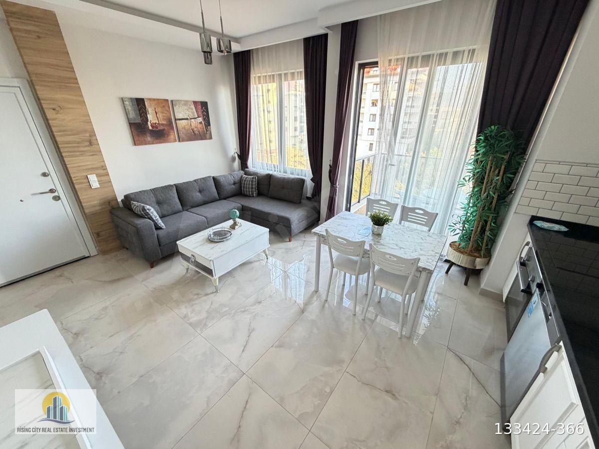KİRALIK SIFIR EŞYALI DENİZ MANZARALI 1+1 DAİRE