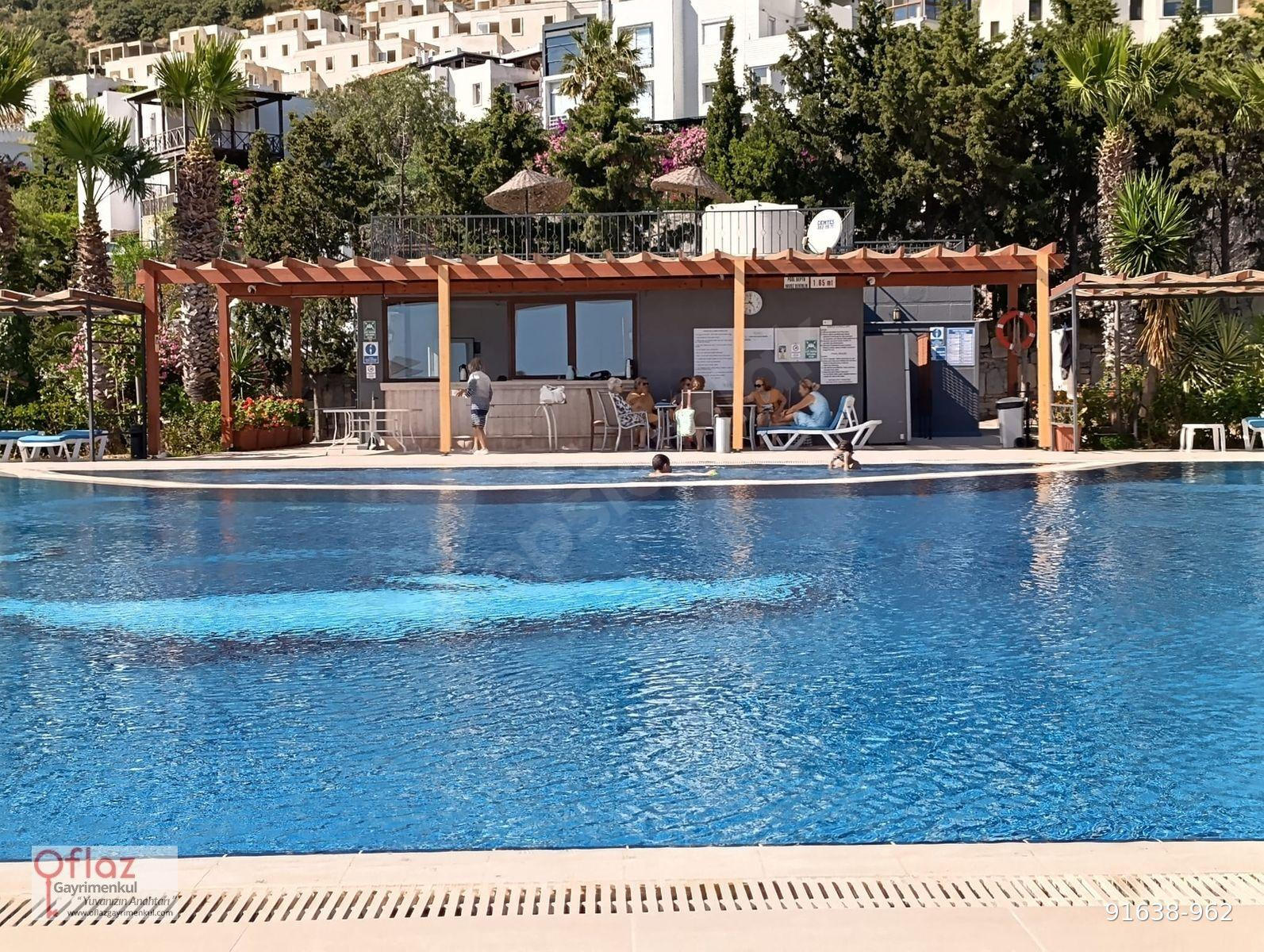 Bodrum Gümüşlükte Satılık Deniz Manzaralı Bahçe Katı Daire