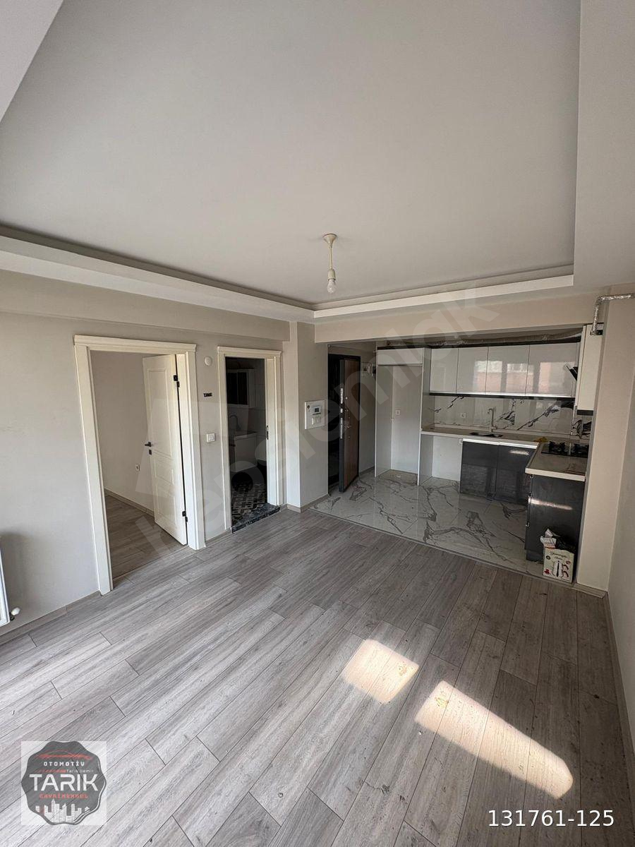 TARIK DEMİR GAYRİMENKUL'DEN BELEDİYE YANI 1+1 SIFIR DAİRE