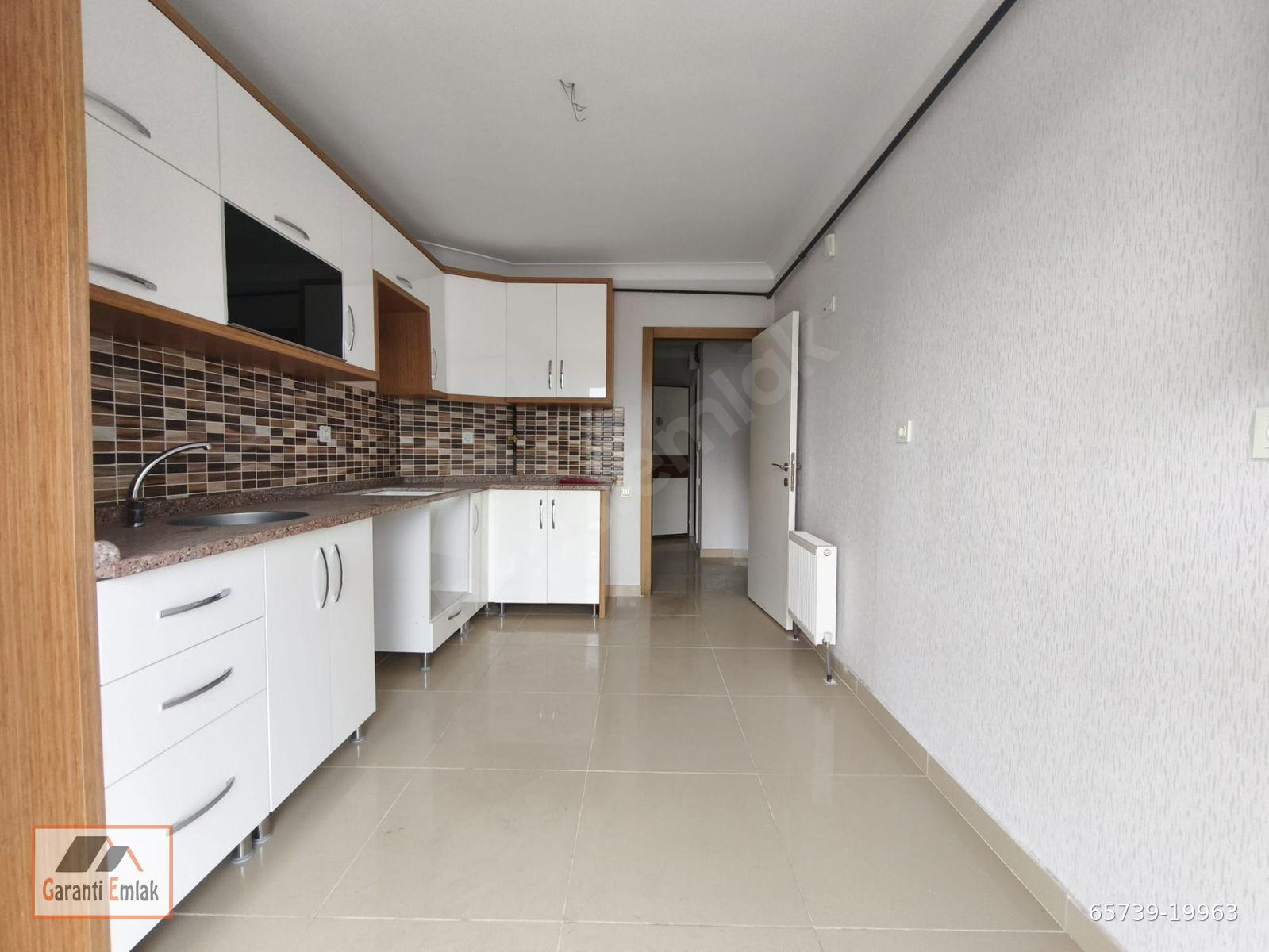 GARANTİ EMLAK'TAN SATILIK MANZARALI MASRAFSIZ 3+1 DAİRE