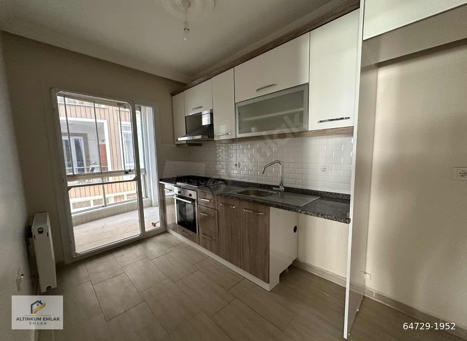 Altınkum Emlak'ta kat kaloriferli 2+1 90m2 satılık daire