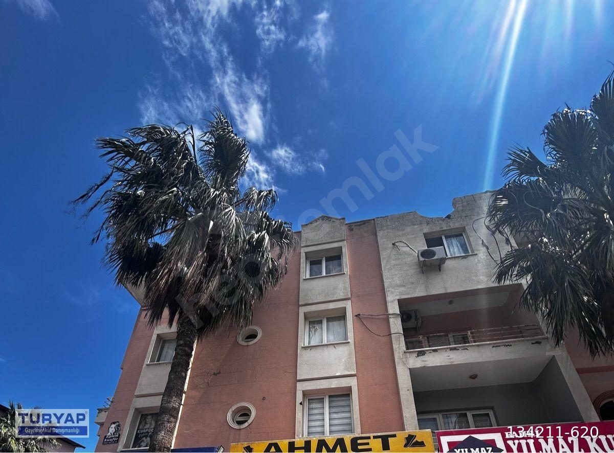 MKÜ karşısında satılık daire