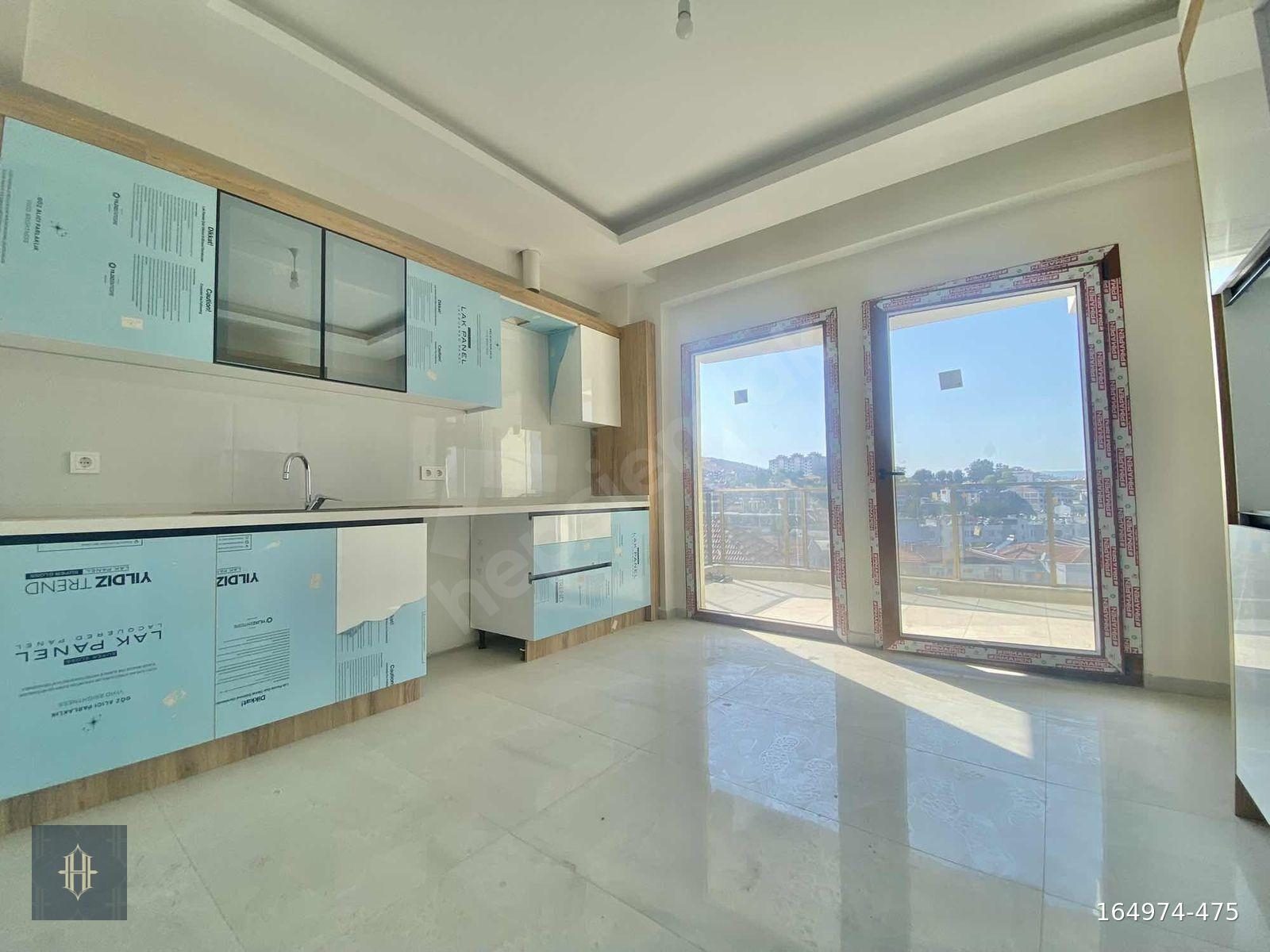 Milas'ta Satılık 4+1 135 m2 Dubleks Daire Harmaya Real Estate