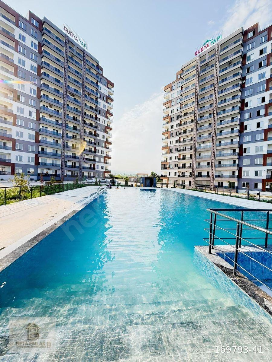 ARPAÇBAHŞIŞ DE SATILIK HAVUZLU 1+1 DAİRE