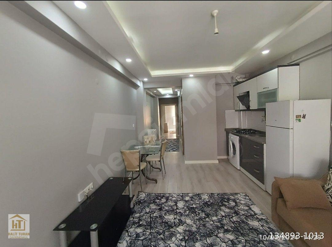 HALİT TURAN GAYRİMENKUL *ABONELİK AÇIK 1+1 EŞYALI ASANSÖRLÜ YENİ BİNA **GÜLLÜK COLLESİUM ARKASI