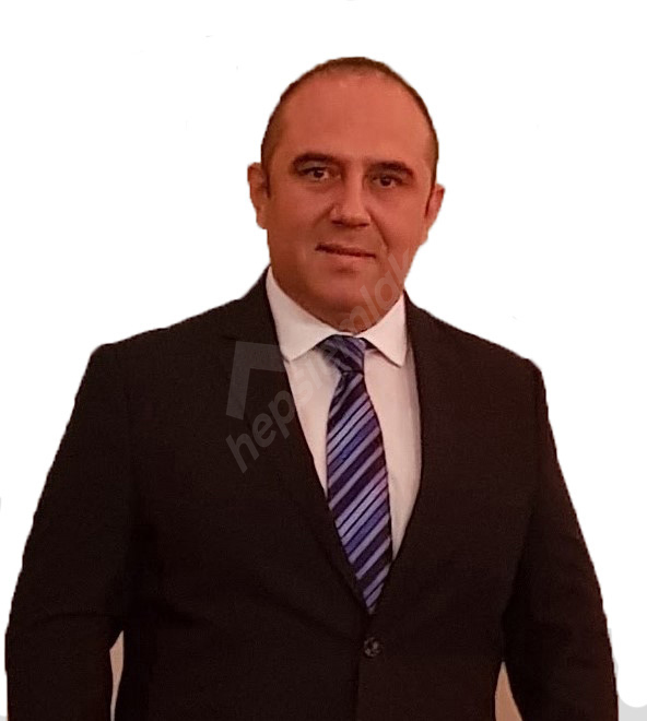 İLKER AY