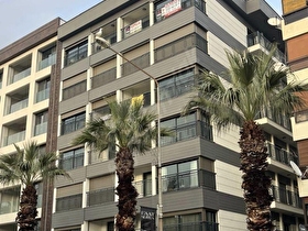 Özel Emlak tan Bostanlı yalısında yeni bine 3 cepheli köşe