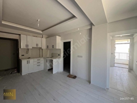 ASEN GAYRİMENKULDEN GÜZELYURTTA SATILIK İÇİ YAPILI 1+1 DAİRE