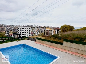 KÖRFEZDE HAVUZLU FERAH SATILIK 1+1 DAİRE