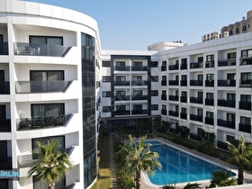 Kuşadasında Denize Sadece 20 Metre Mesafede, 7/24 Güvenlikli, Kapalı Otoparklı, Havuzlu Lüks Daire