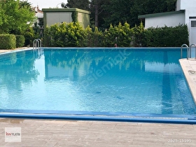 CELALİYEDE BUTIK SİTEDE HAVUZLU SATILIK TRİPLEKS VİLLA