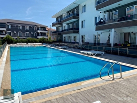 HAVUZLU, GÜVENLİKLİ, MODERN YAŞAM: ARSLANDA 1+1 DAİRE !!