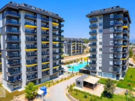 OLİVE PARADİSE İSKANLI DENİZ MANZARALI 1+1 DAİRE ALANYA AVSALLAR