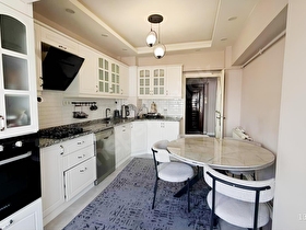 REMAX MAVİDEN ÇARŞI MERKEZDE SATILIK GENİŞ 3+1 GARAJLI DAİRE