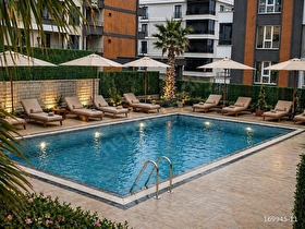 YÜZME HAVUZLU SIFIR EŞYALI YÜKSEK KREDİLİ 1+1 SIFIR DAİRE
