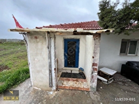 ÇARDAKDA TEK TAPU BAHÇELİ MÜSTAKİL EV VE ARSASI 5.648m2