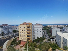 NARLIDERE HUZUR MAHALLESİNDE DENİZ MANZARALI 3+1 SATILIK DAİRE
