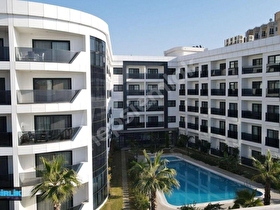 Kuşadasında Denize Sadece 20 Metre Mesafede, 7/24 Güvenlikli, Kapalı Otoparklı, Havuzlu Lüks Daire