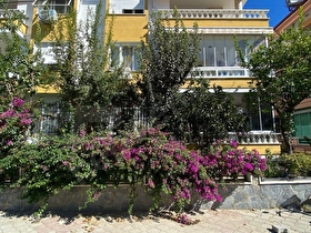 Işık emlak tan Altınoluk merkezde satılık giriş kat daire