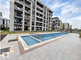 Aksu Altıntaş İskanlı - Yaşam Başlamış Sitede 1+1 Bahçe Katı