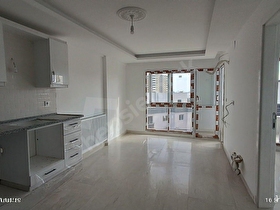EKBDEN TAŞUCU MERKEZDE OTOPARKLI SİTE İÇİNDE FIRSAT 1+1 DAİRE