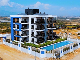 FALEZLERİN ÜZERİNDE DENİZ MANZARALI LÜKS MOBİLYALI 2+1 DAİRE