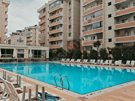GÜZELTEPE KONUTLARINDA HAVUZLU ARA KAT SATILIK 3+1