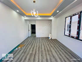 GÜVENDEN KAPAKLIDA MERKEZİ KONUMDA YERDEN ISITMALI 1+1 DAİRE