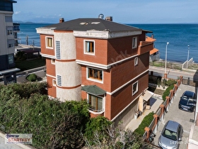 GÜZELBAHÇE SİTELERDE DENİZE SIFIR 450m²ARSA İÇİNDE