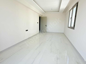 GÖRALDAN MURADİYE SİTE İÇERİSİNDE 2+1 K MUTFAK ARAKAT DAİRE