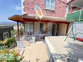 Seferihisar Ürkmez merkezde satılık 1 + 1 deniz tarafında daire