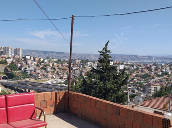 bayrakli onur mahallesi korfez evleri perla market yani satilik mustakil bina 23286 303 hepsiemlak